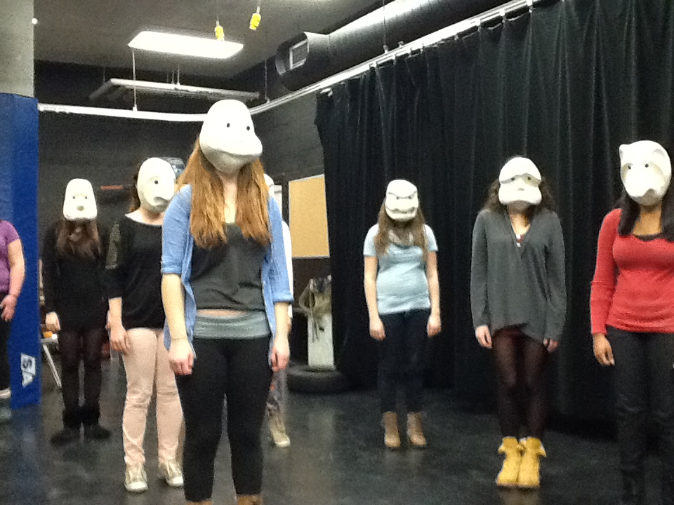 Drama students in masks