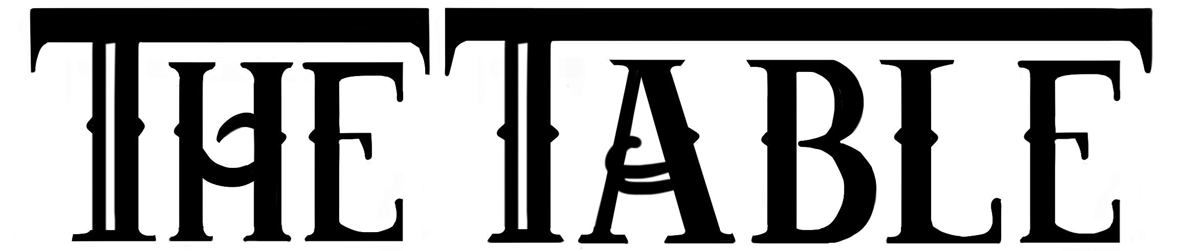 Text reads The Table in elaborate font