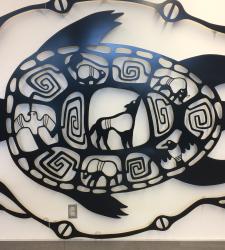 A close up of the Aaniin Community Centre mural.