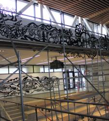 A portion of the Aaniin Community Centre mural under construction.