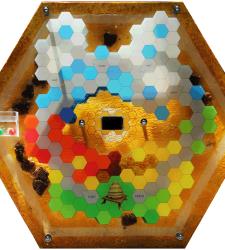 A multimedia interactive artwork shaped like a honeycomb designed to support the Markham Museum's education programs.